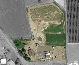 Aerial view of property and surrounding area with rural landscape