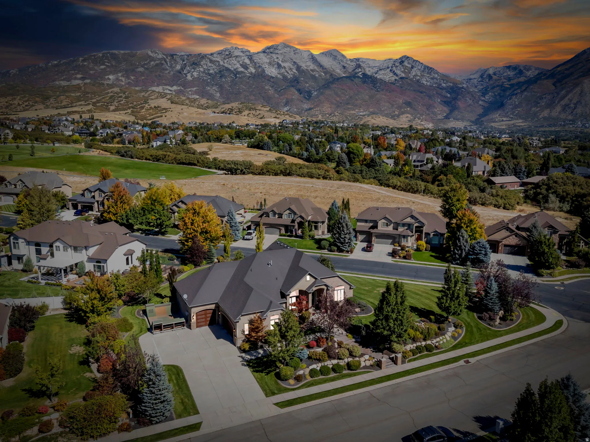 Fall Aerial view at dusk of front of home
