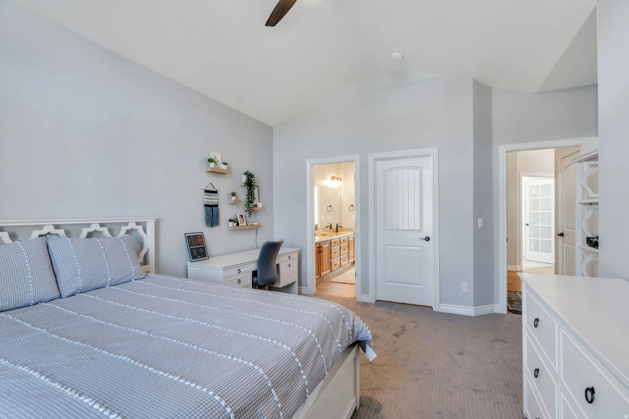 Bedroom featuring carpet, ceiling fan, and Jack and jill bathroom