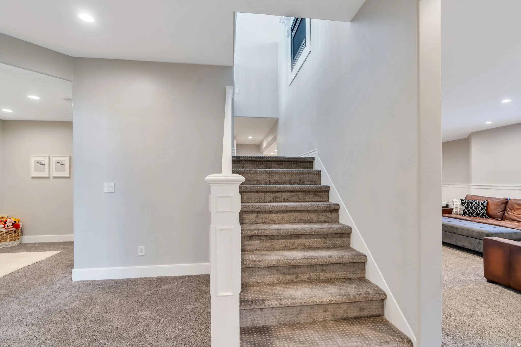 Stairway featuring recessed lighting and carpet floors