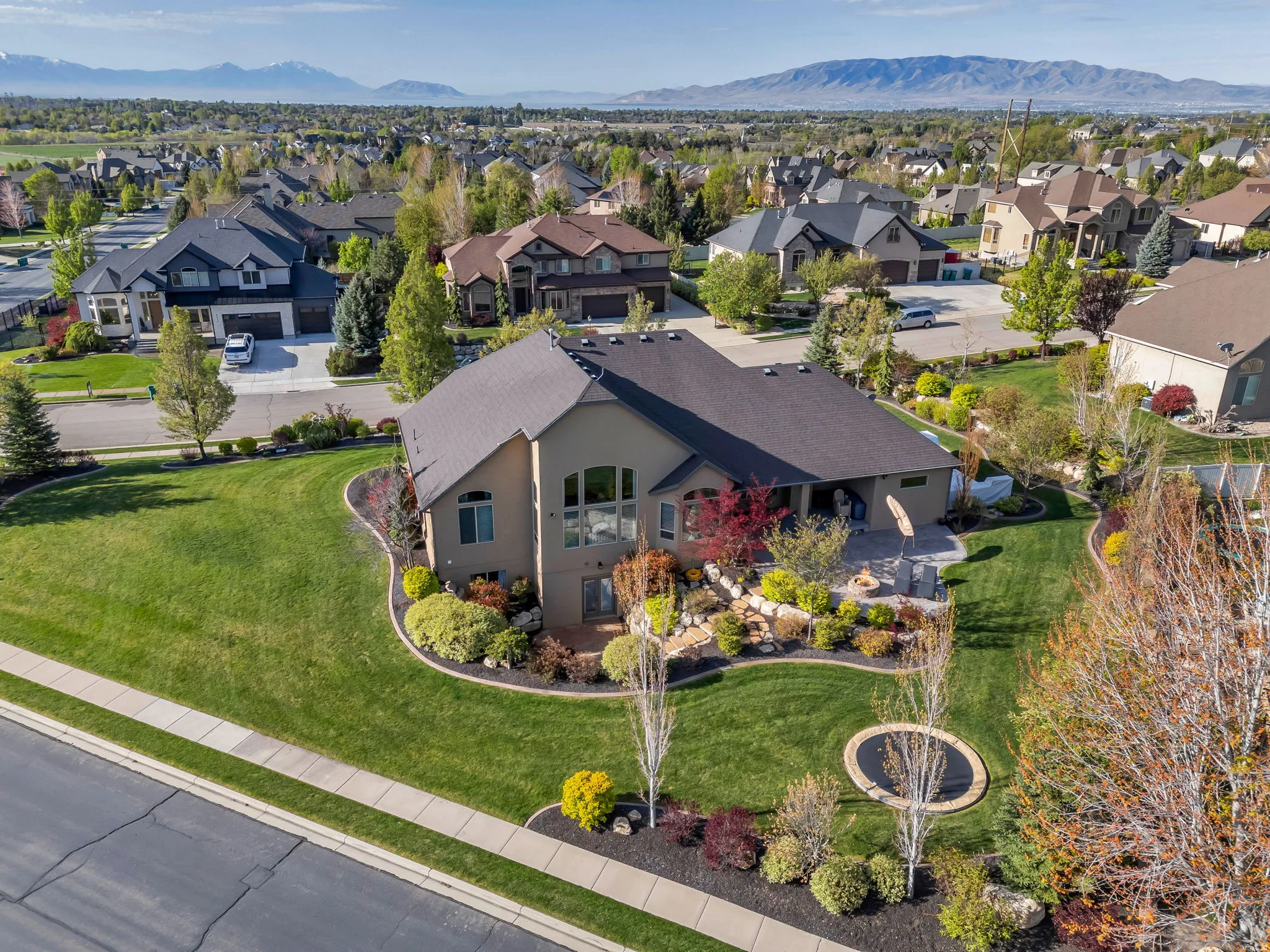 Spacious property featuring expansive lawns and mature landscaping