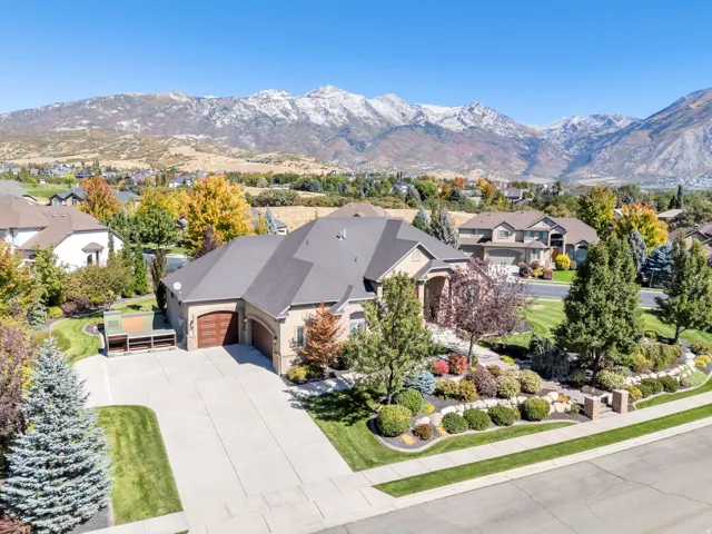 Aerial view of residential area featuring mountains