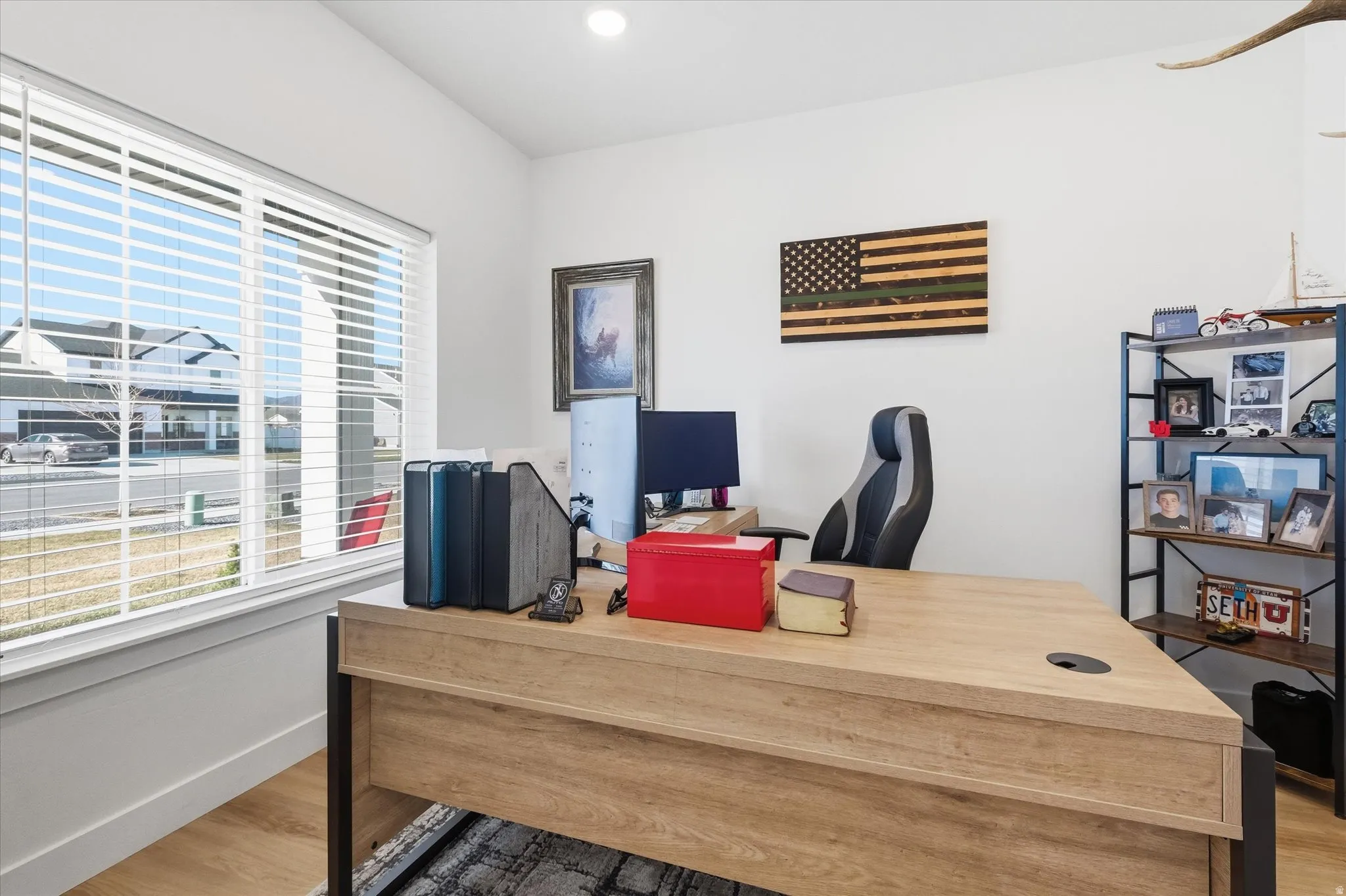 Home office featuring wood finished floors and recessed lighting