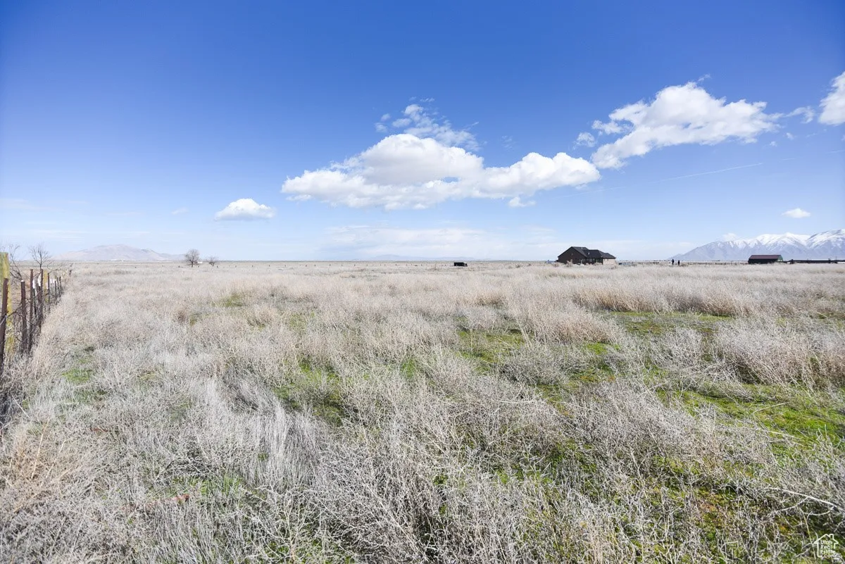View of undeveloped land featuring rural landscape and a mountain backdrop