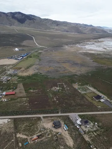 View of property location featuring a mountain backdrop and rural landscape