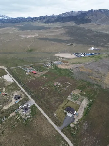 View of property location featuring a mountainous background and rural landscape
