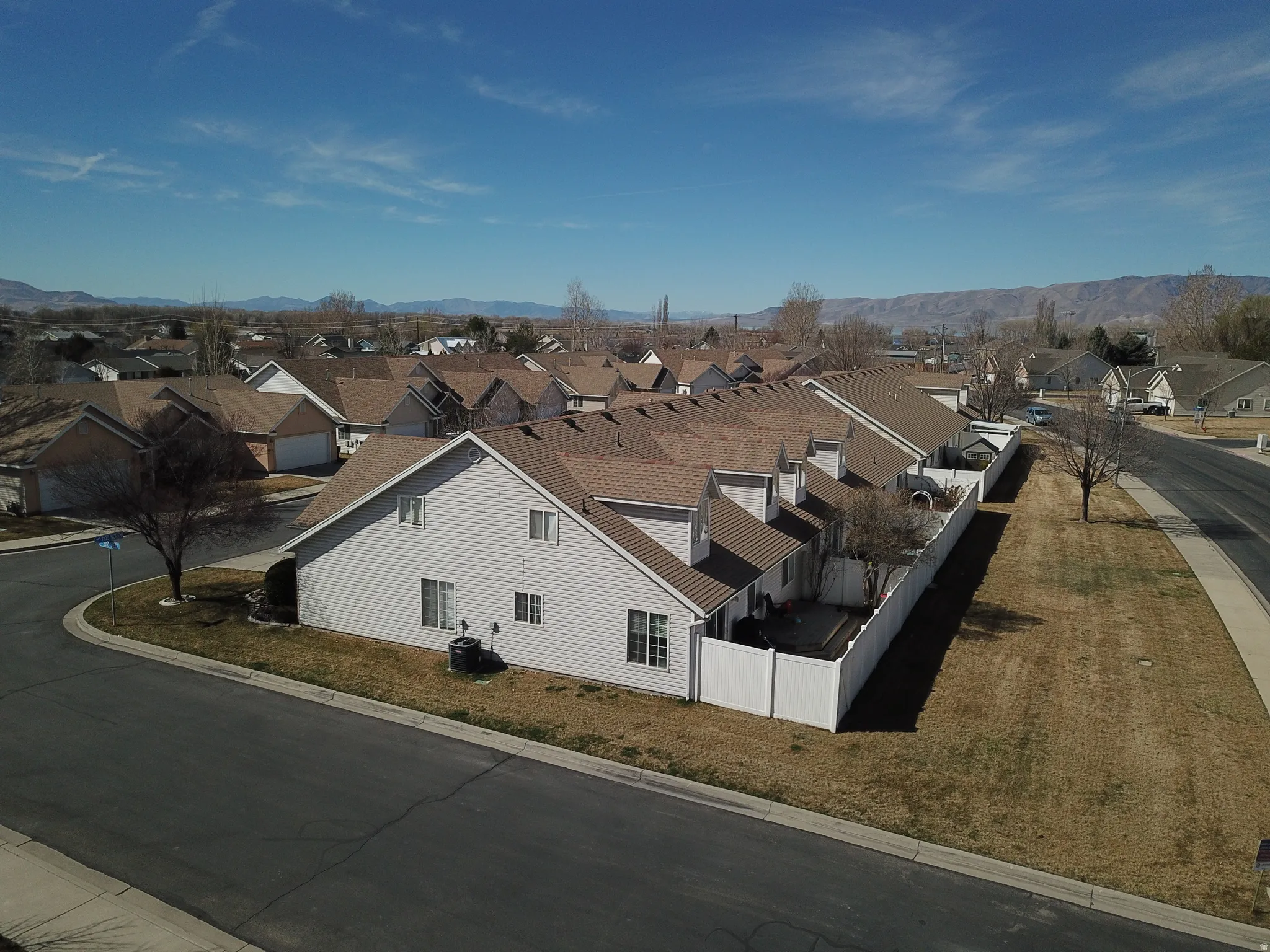 Aerial perspective of suburban area featuring mountains