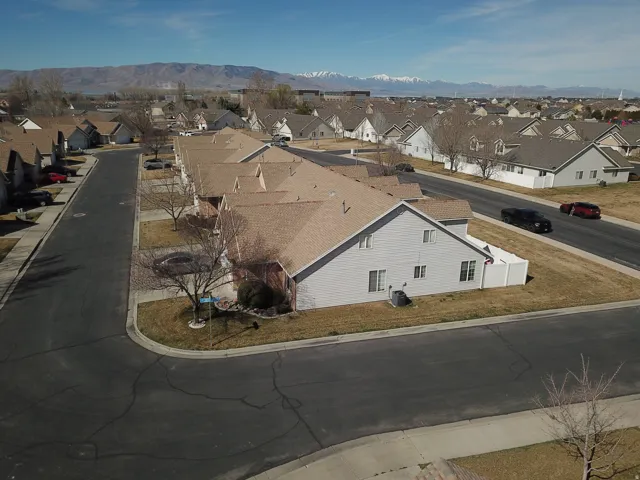 Aerial view of residential area with a mountain backdrop