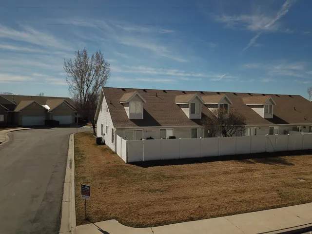 View of side of home with a residential view