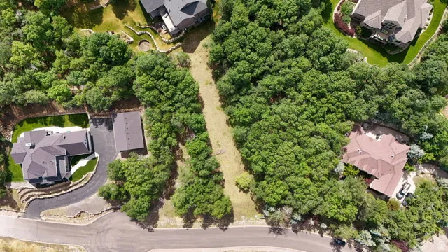 Expansive wooded lot offering privacy and natural surroundings