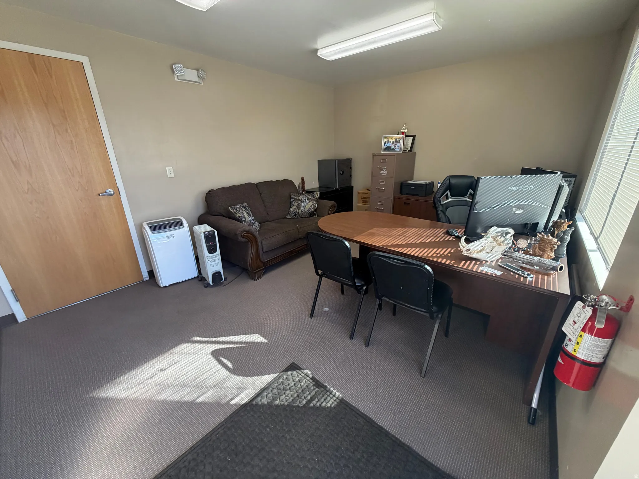 Office space featuring carpet flooring