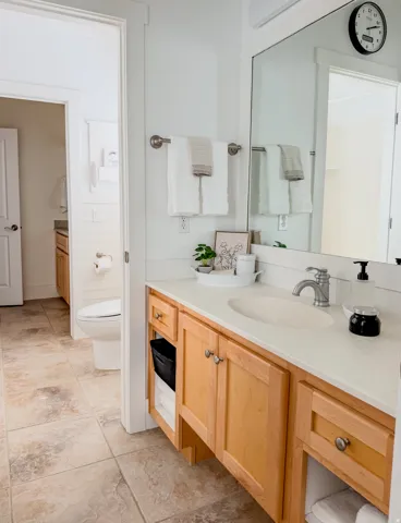Bathroom with vanity and toilet