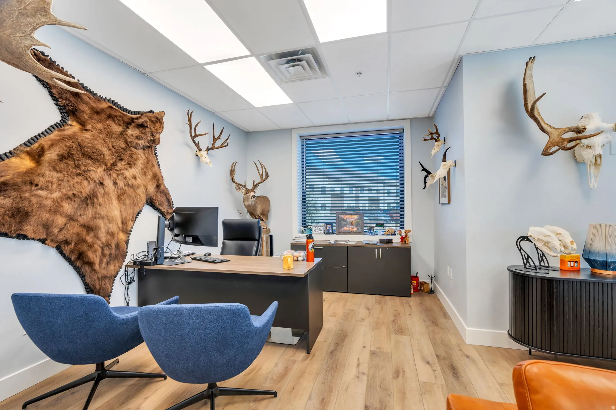 Office area featuring a paneled ceiling