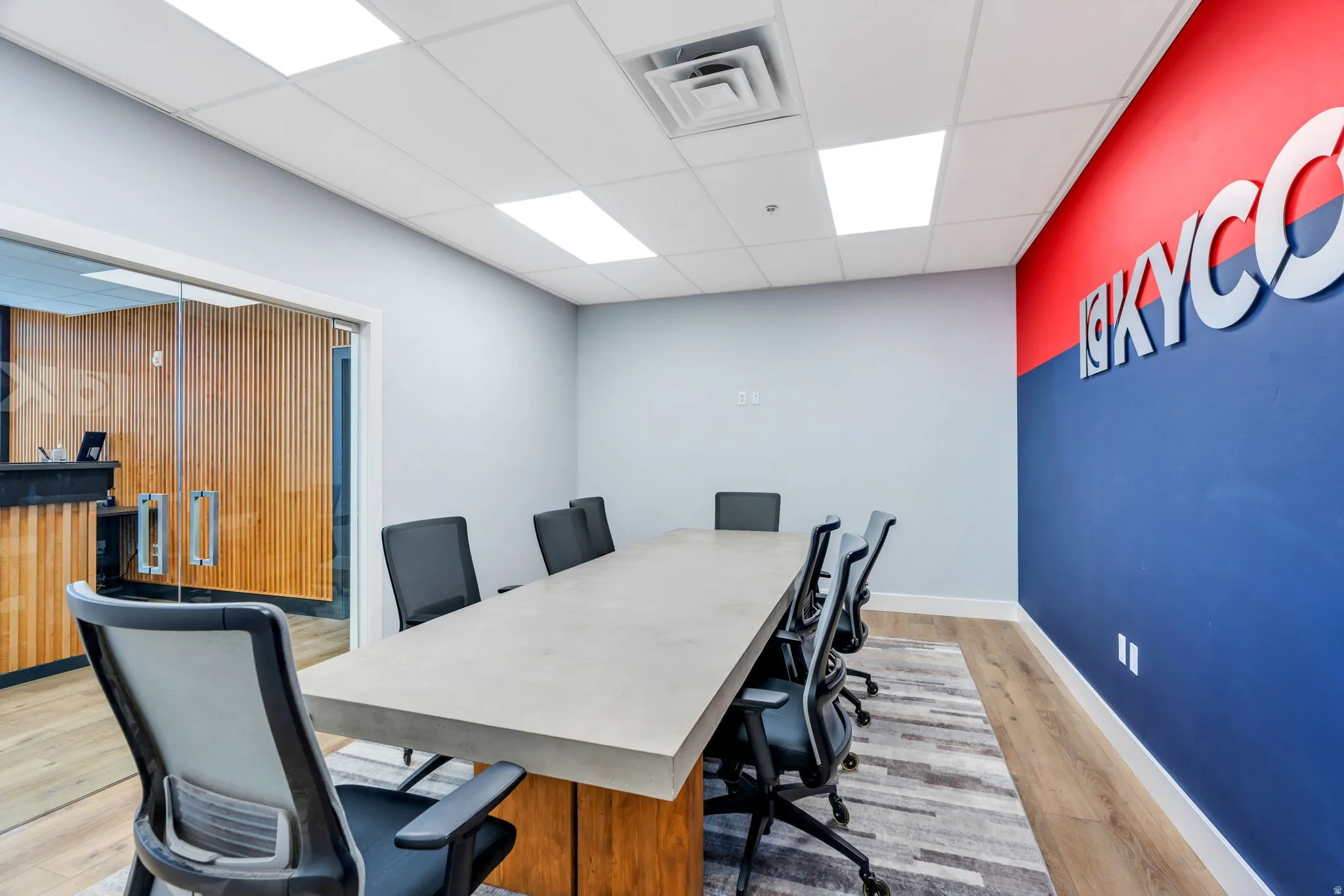 Office with a paneled ceiling