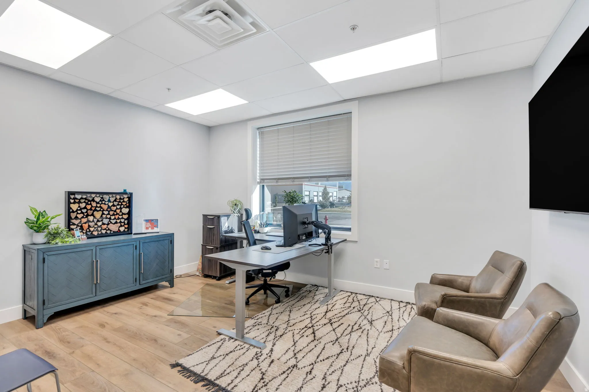 Home office with a drop ceiling