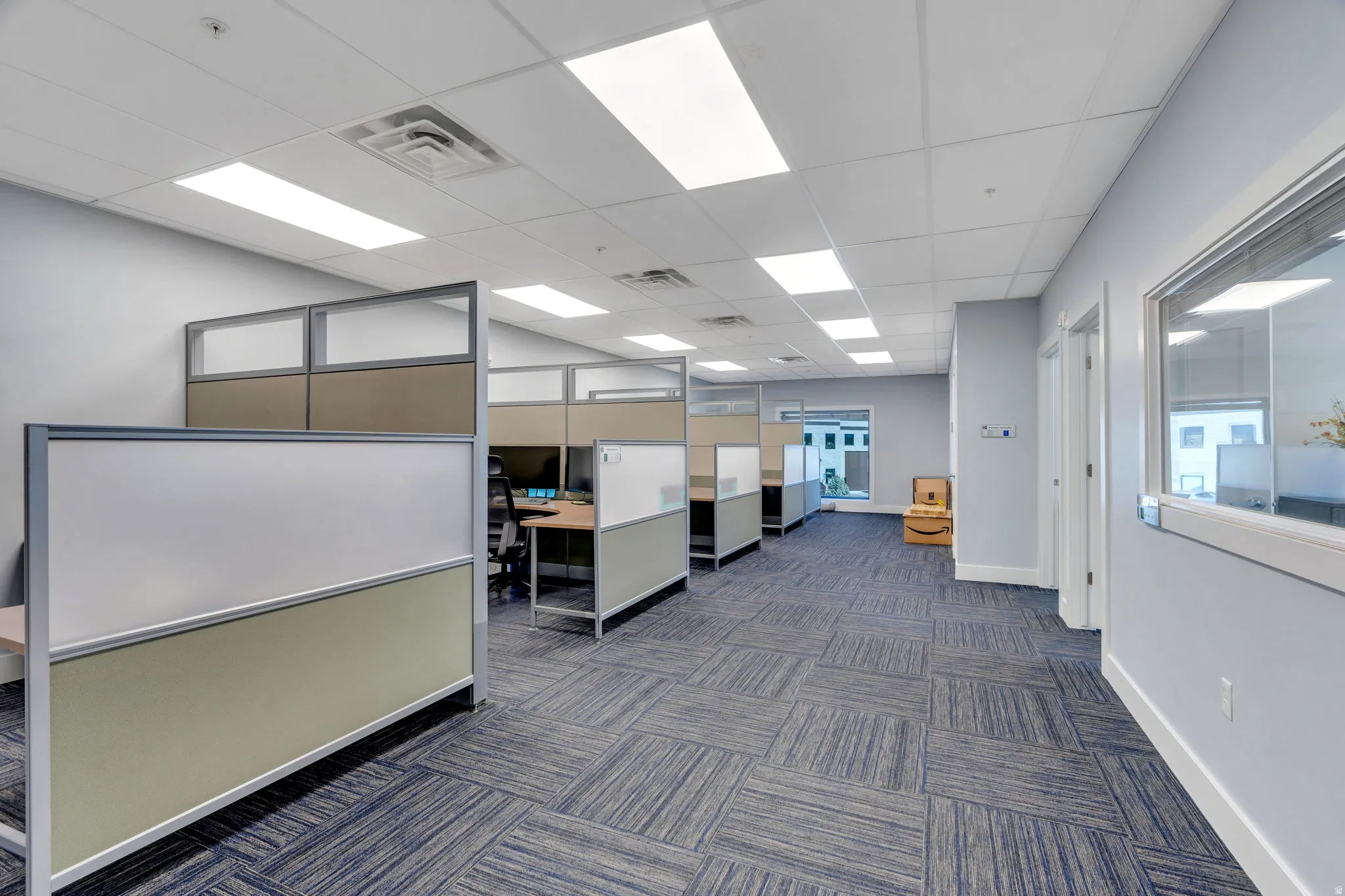 Office featuring a drop ceiling