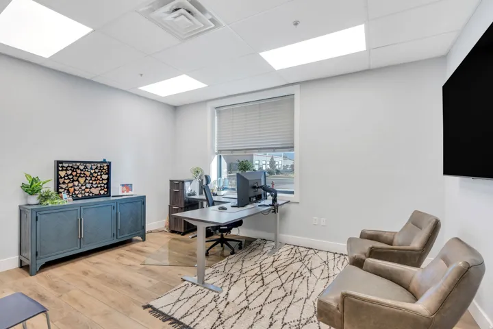 Home office with a drop ceiling