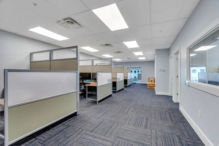 Office featuring a drop ceiling