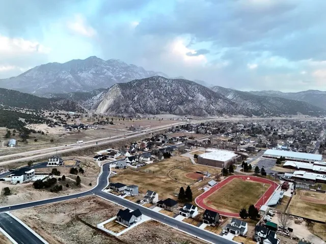 Aerial perspective of suburban area with mountains