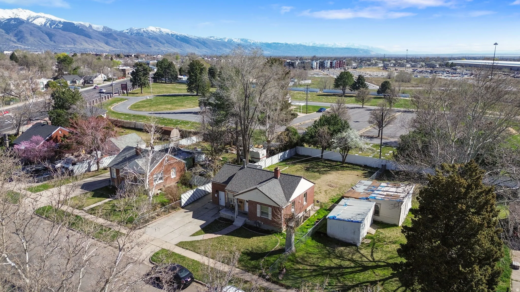 Aerial view of residential area featuring mountains