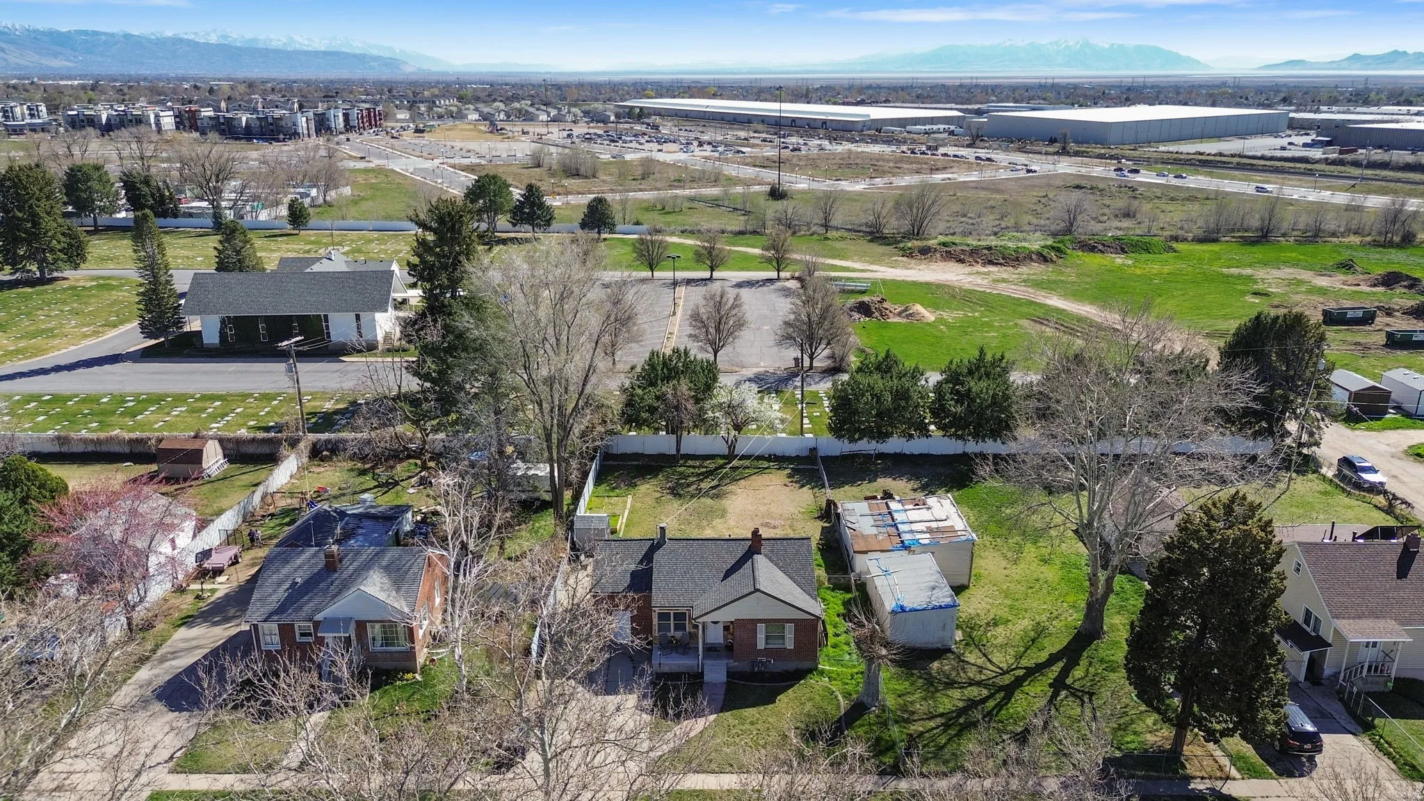 Aerial view of residential area featuring a mountain backdrop