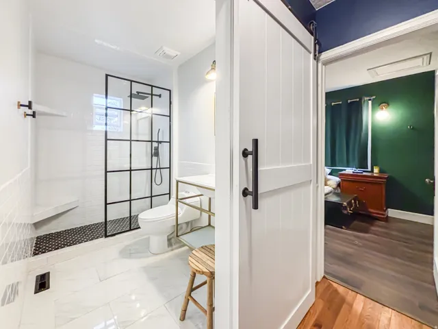 Bathroom with a walk in shower and vanity