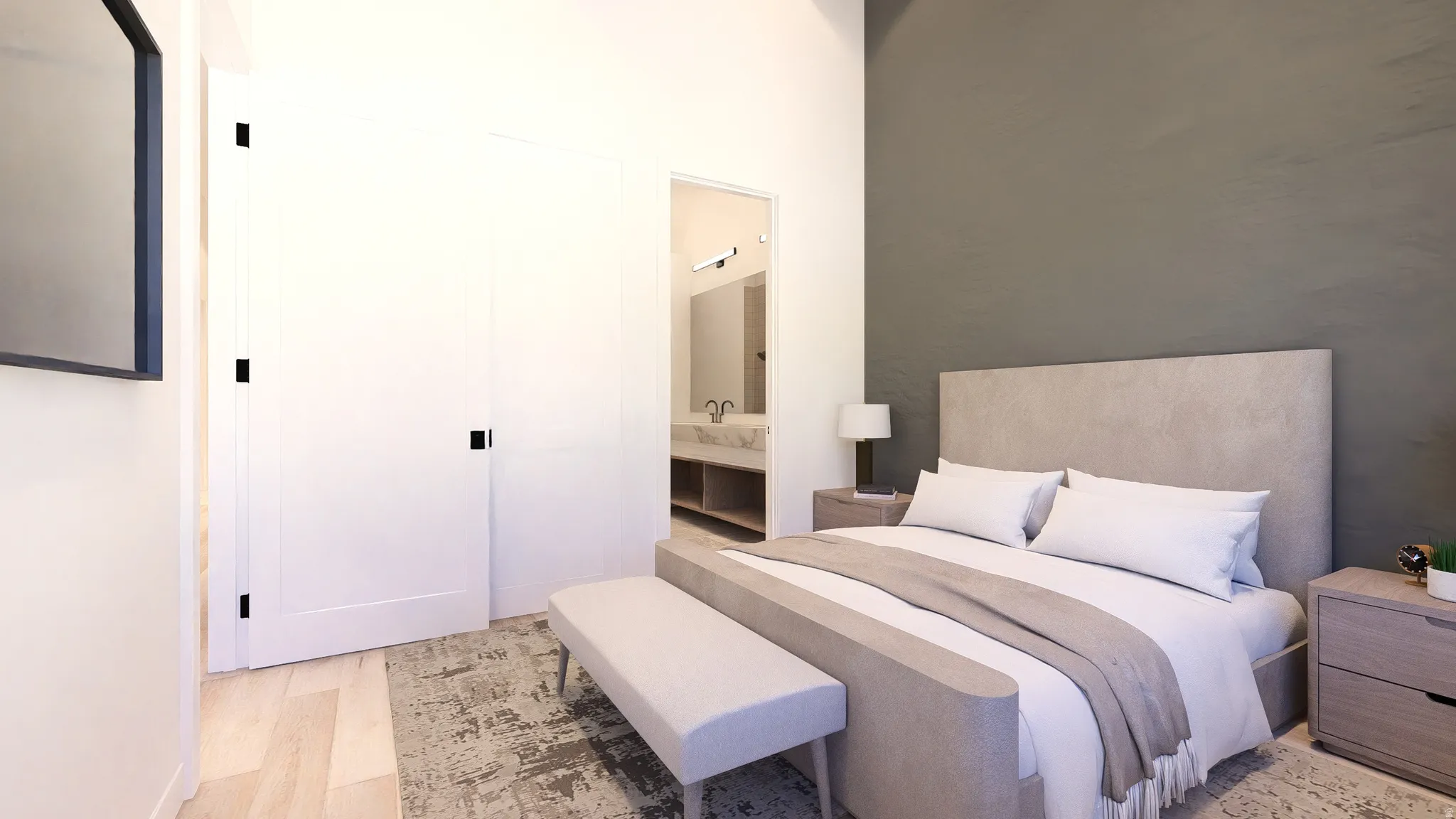 Bedroom with light wood-type flooring and ensuite bathroom