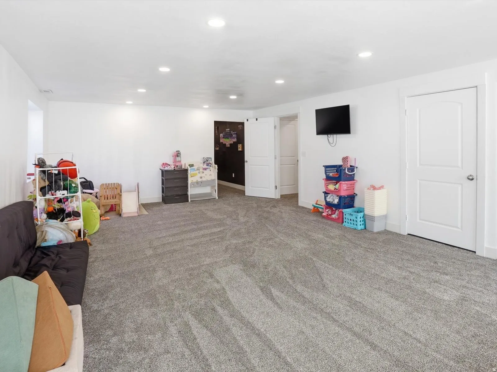 Recreation room featuring carpet and recessed lighting