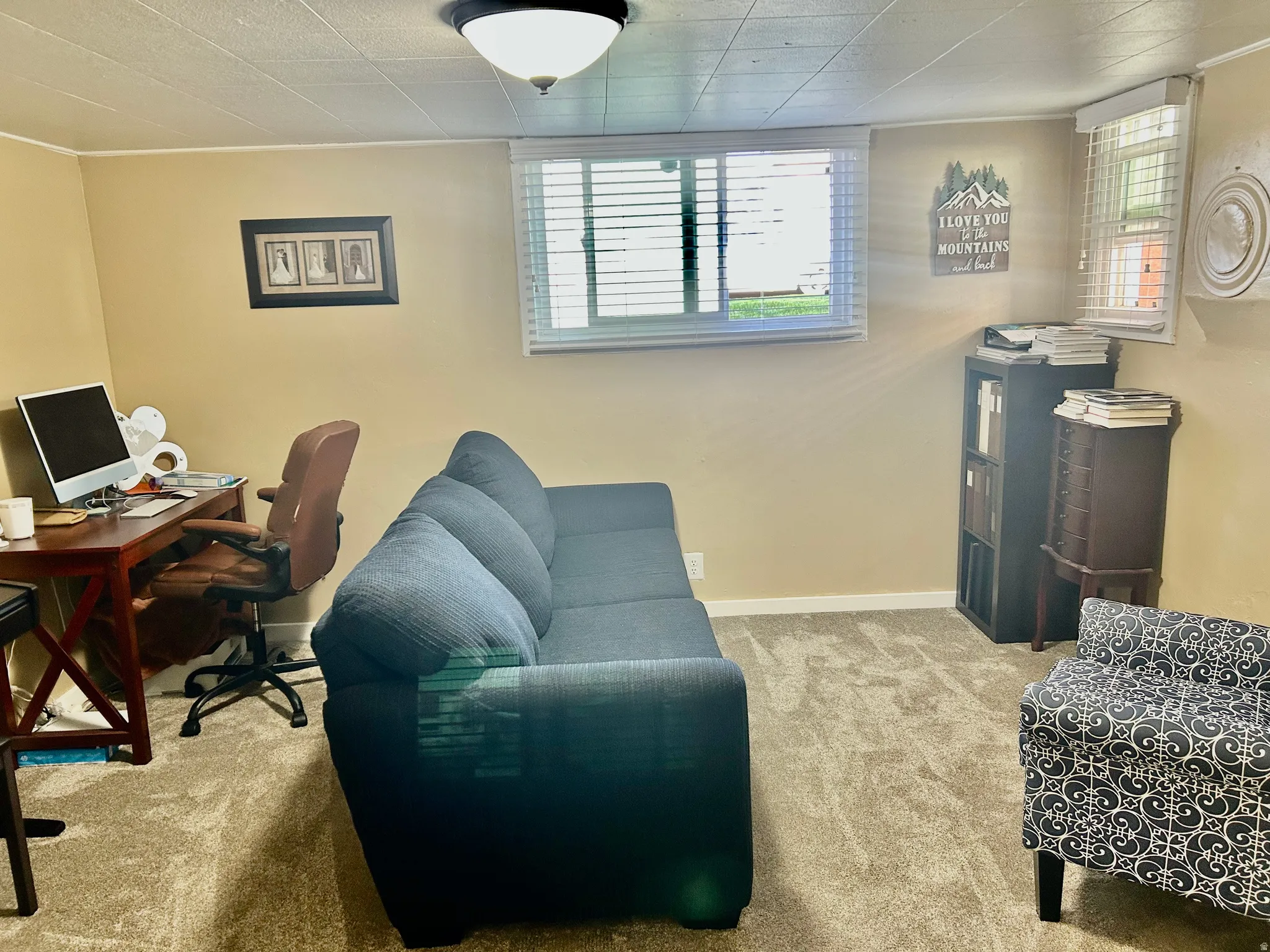 Office area featuring light colored carpet