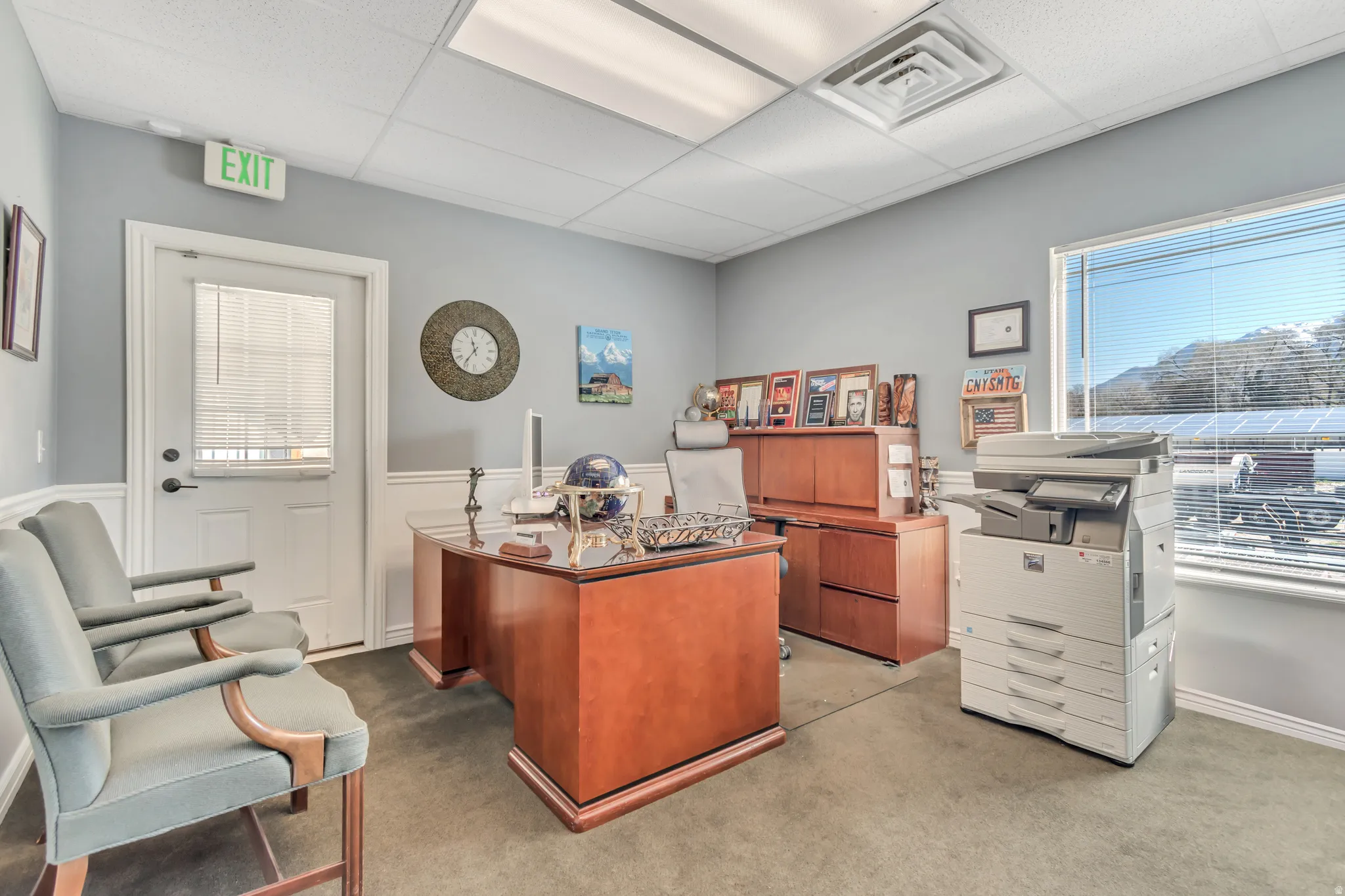 Office featuring a paneled ceiling