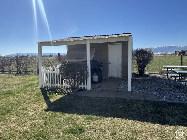 View of shed featuring a mountain view and a view of countryside