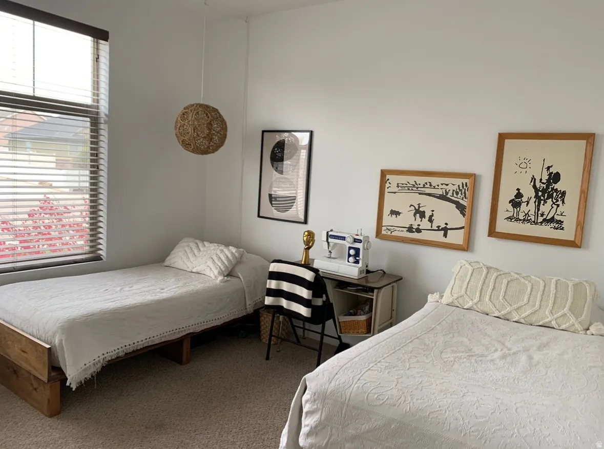 Bedroom featuring carpet floors