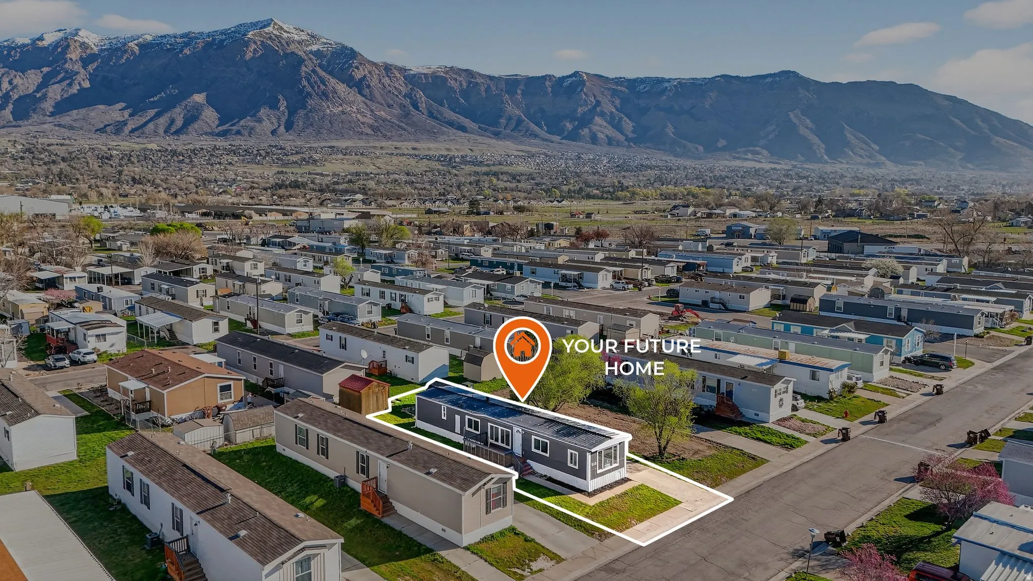 Aerial view of residential area featuring mountains