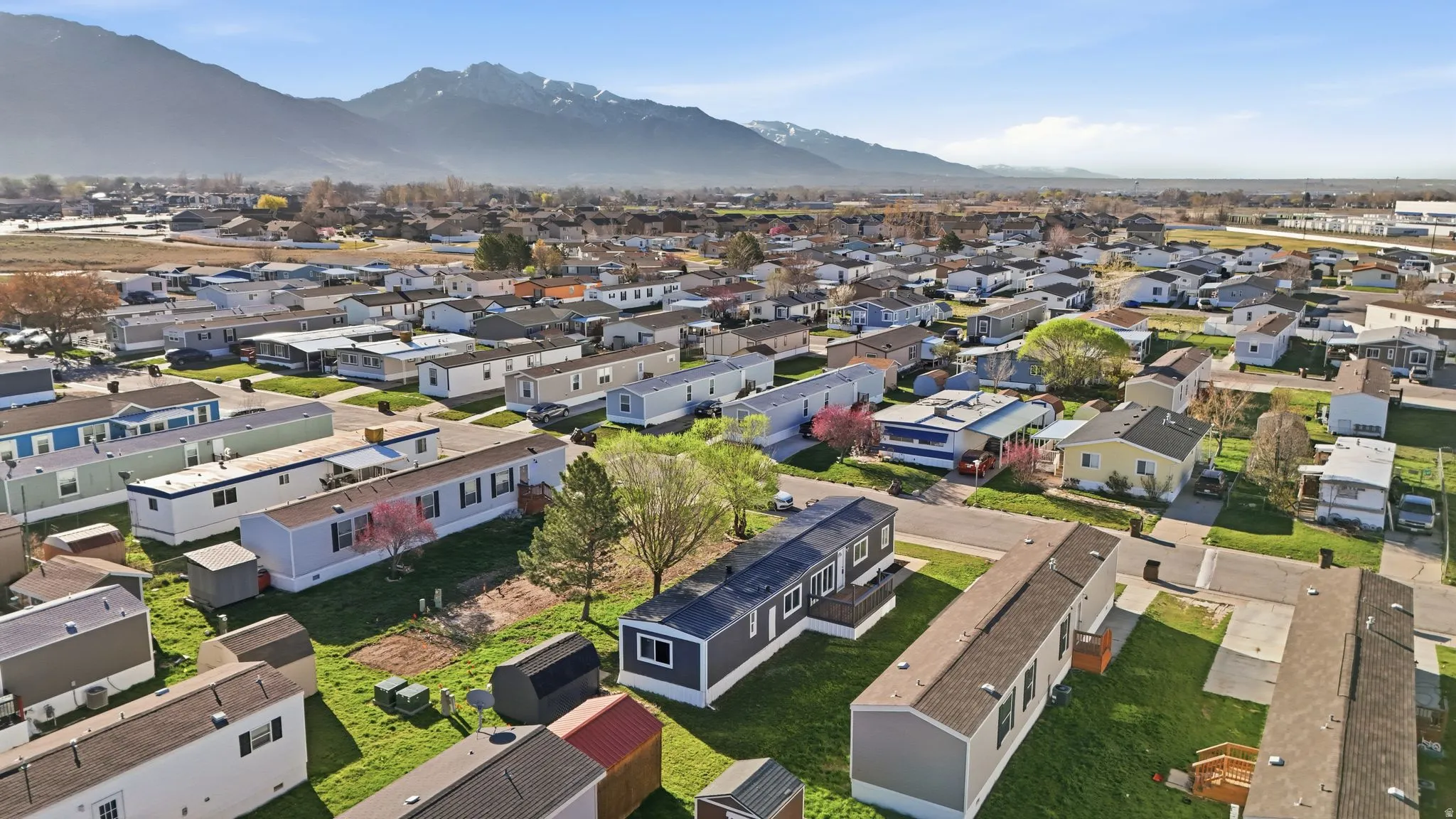 Aerial view of residential area featuring mountains