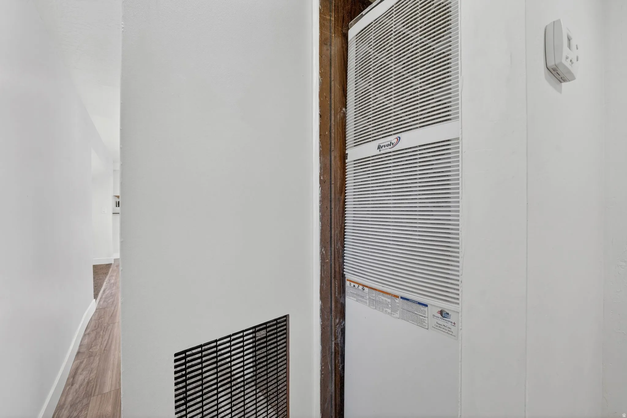 Detailed view of a heating unit and baseboards