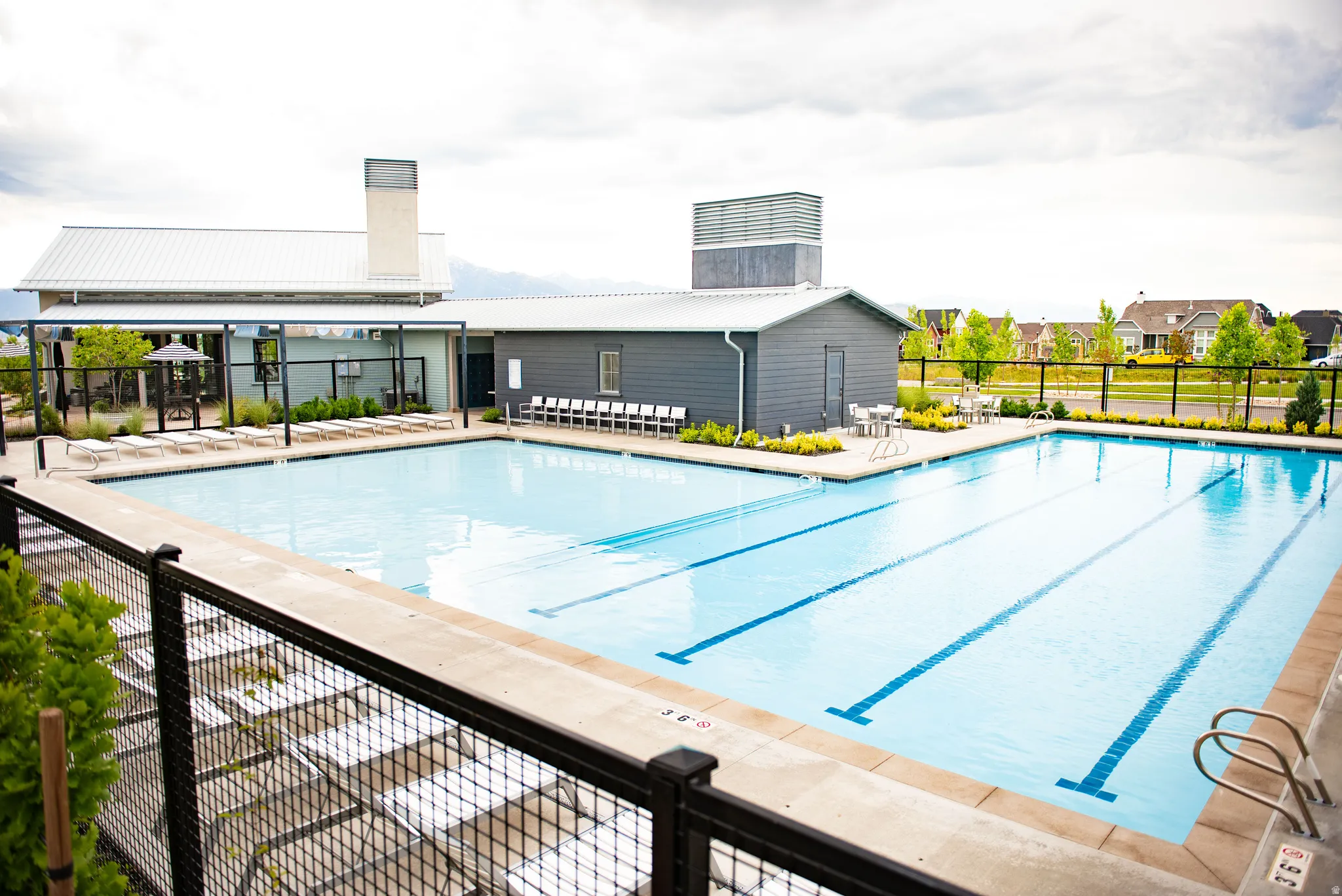 Community pool with a patio area