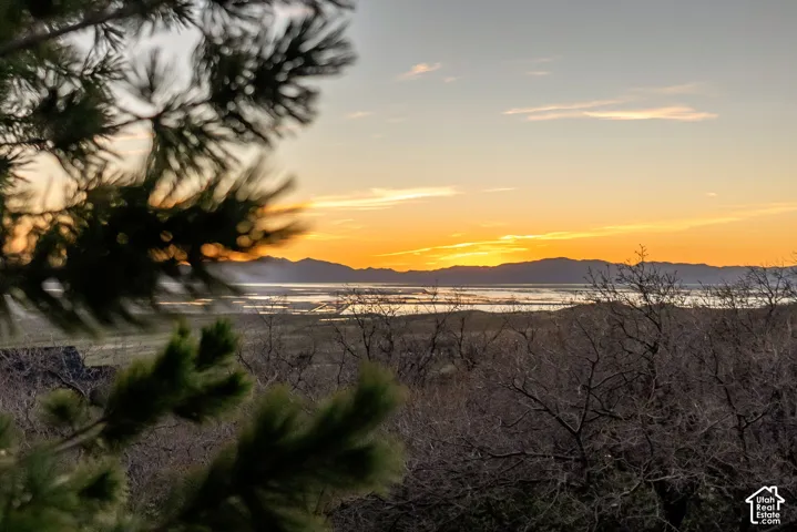 View of mountain backdrop with a large body of water