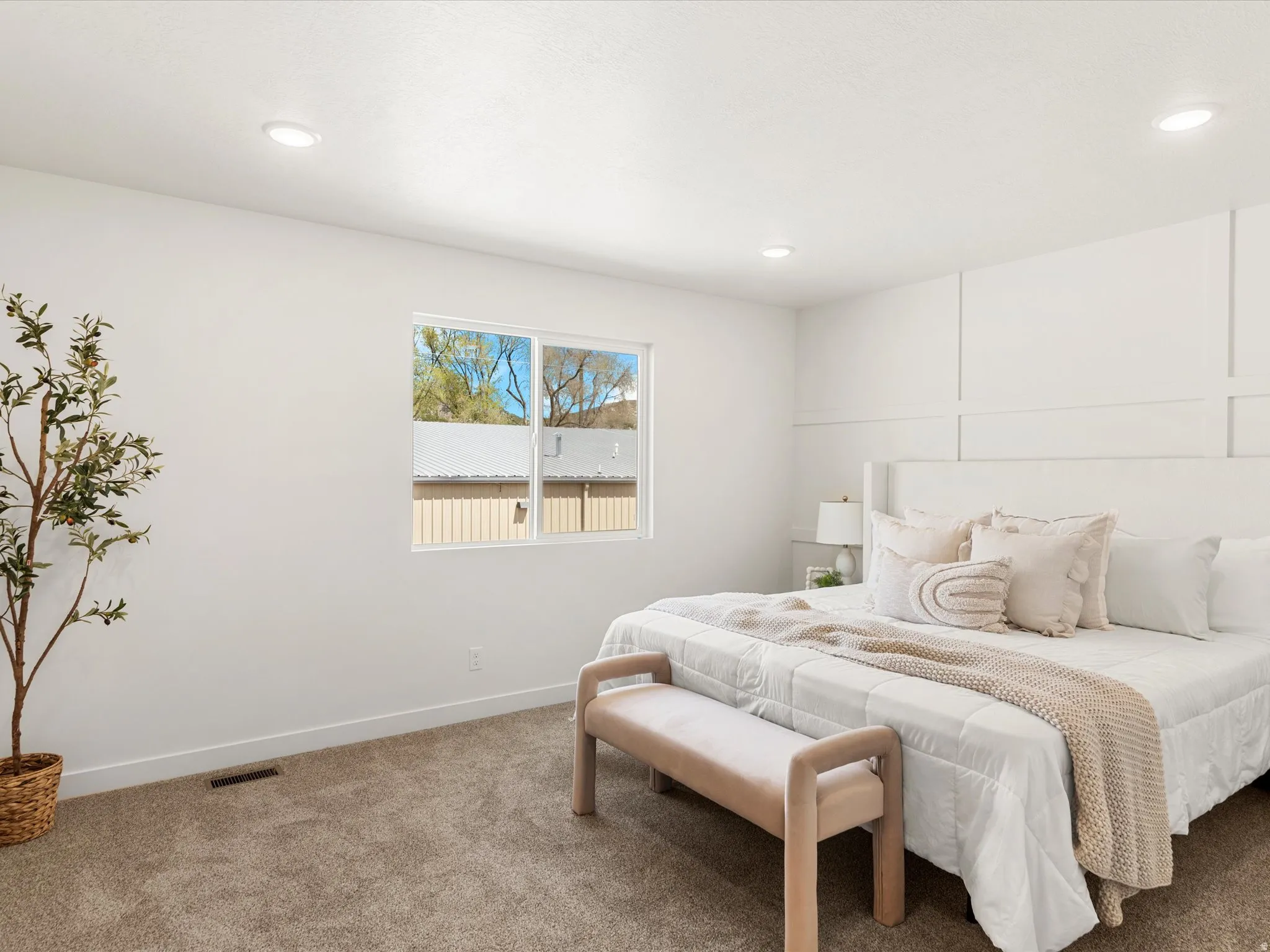Bedroom featuring carpet floors and recessed lighting