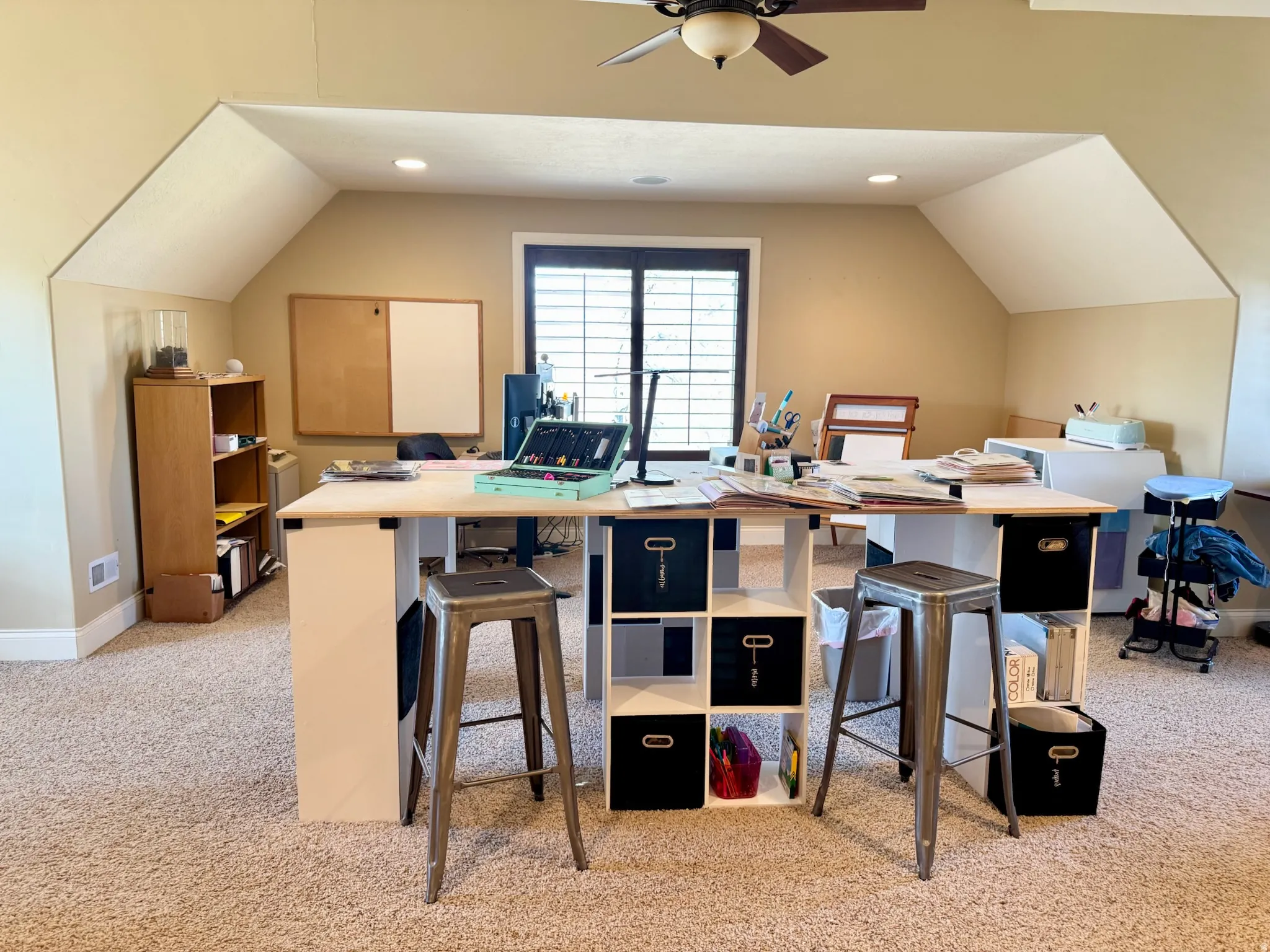 Office space with light colored carpet, recessed lighting, ceiling fan, and vaulted ceiling