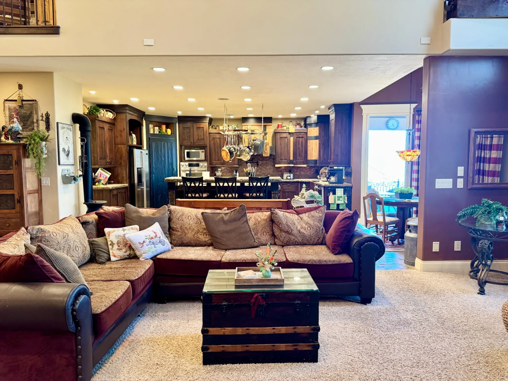 Living room with recessed lighting and light carpet