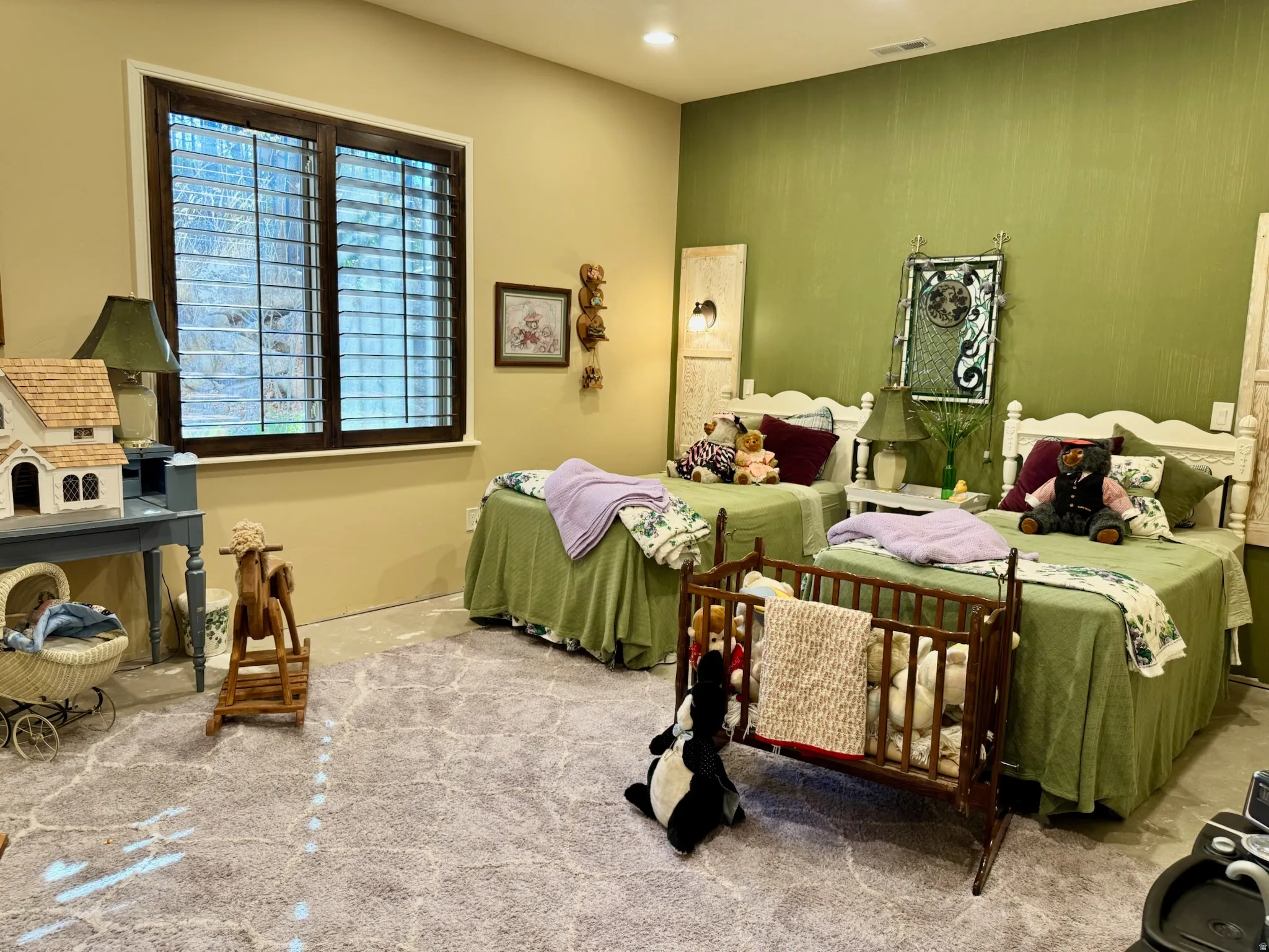 Carpeted bedroom with recessed lighting