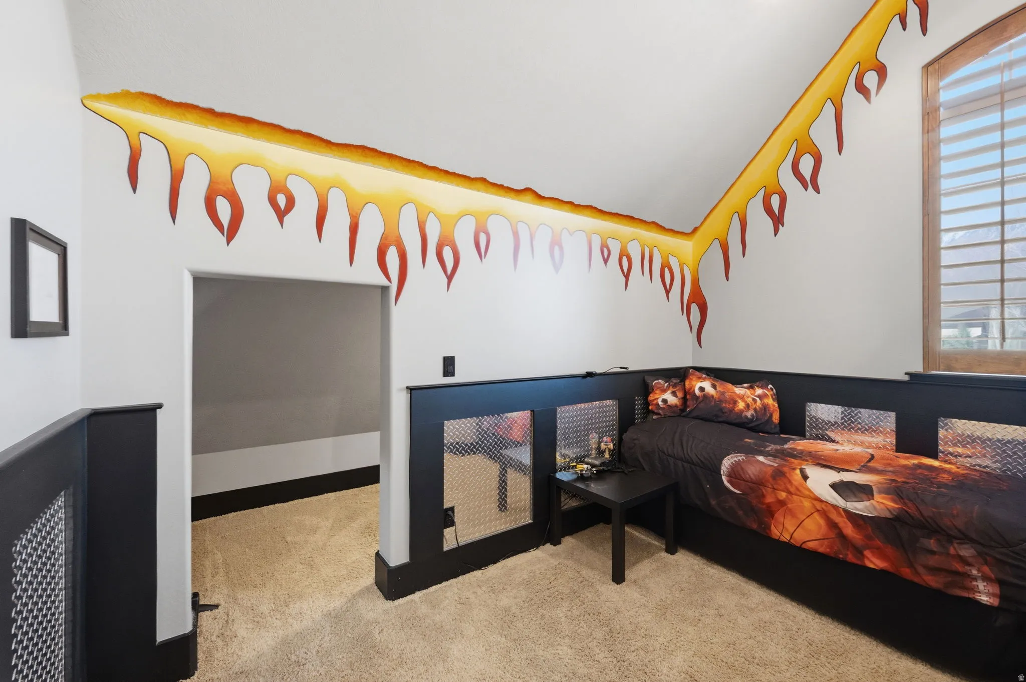 Bedroom with light colored carpet