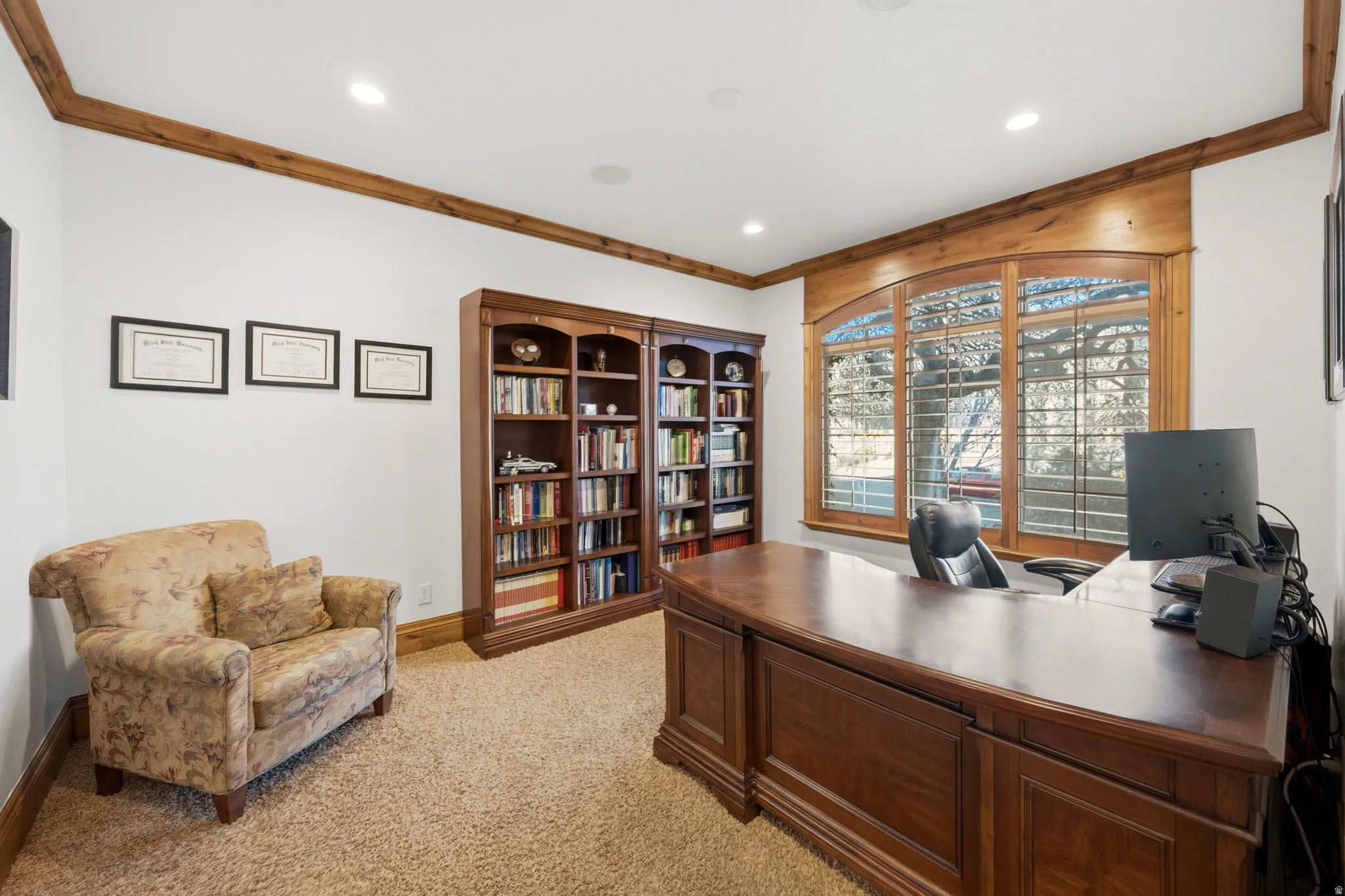 Office area featuring ornamental molding, light carpet, and recessed lighting