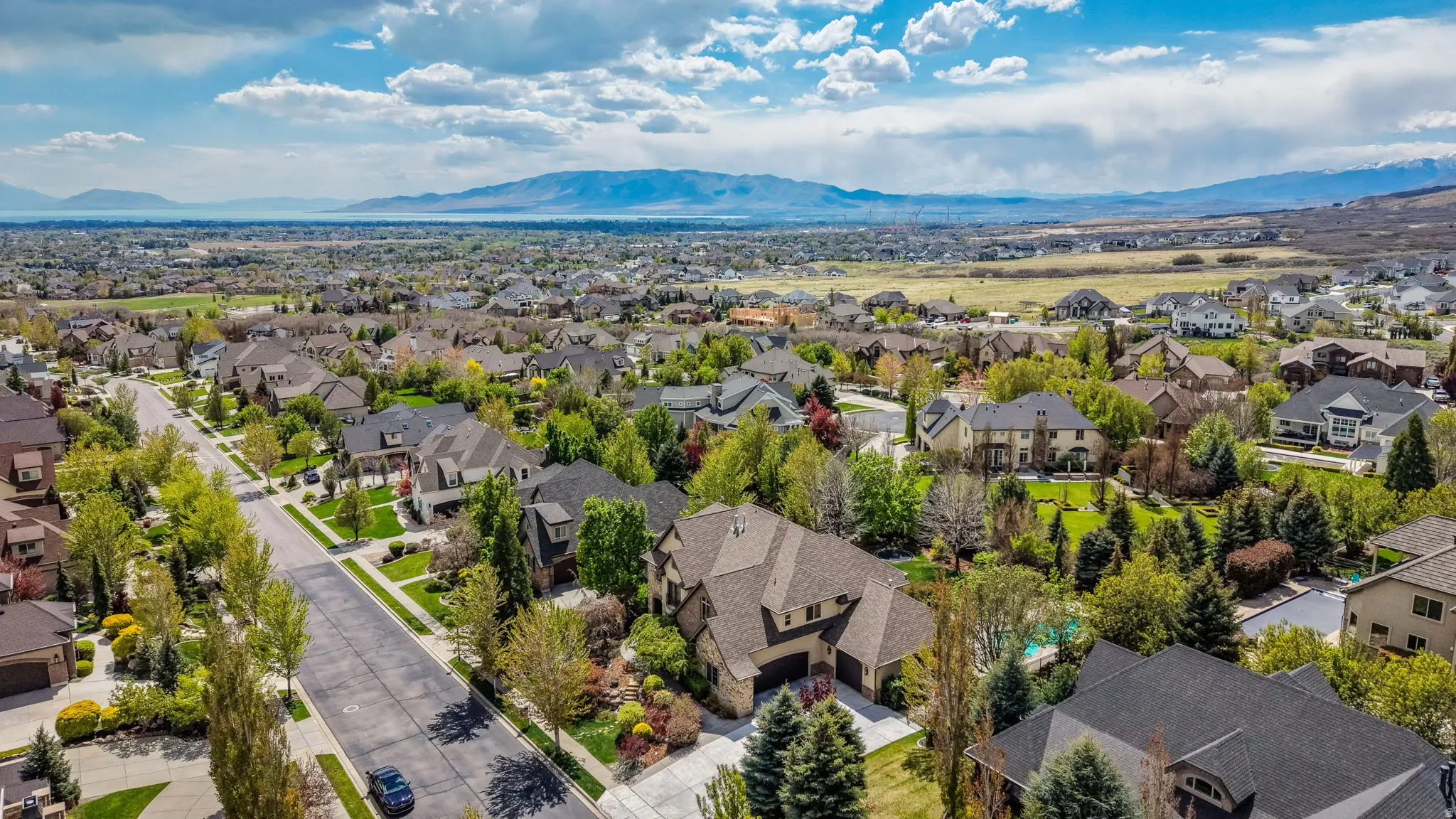 Aerial perspective of suburban area featuring mountains
