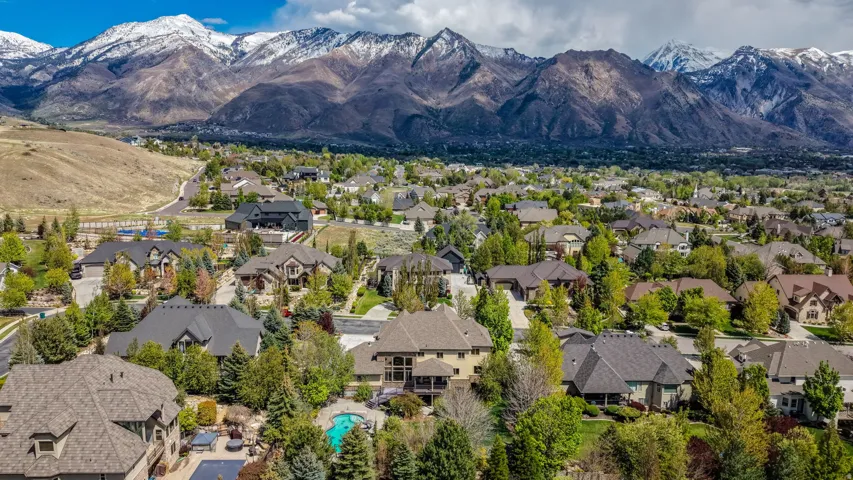 Aerial view of residential area with a mountainous background