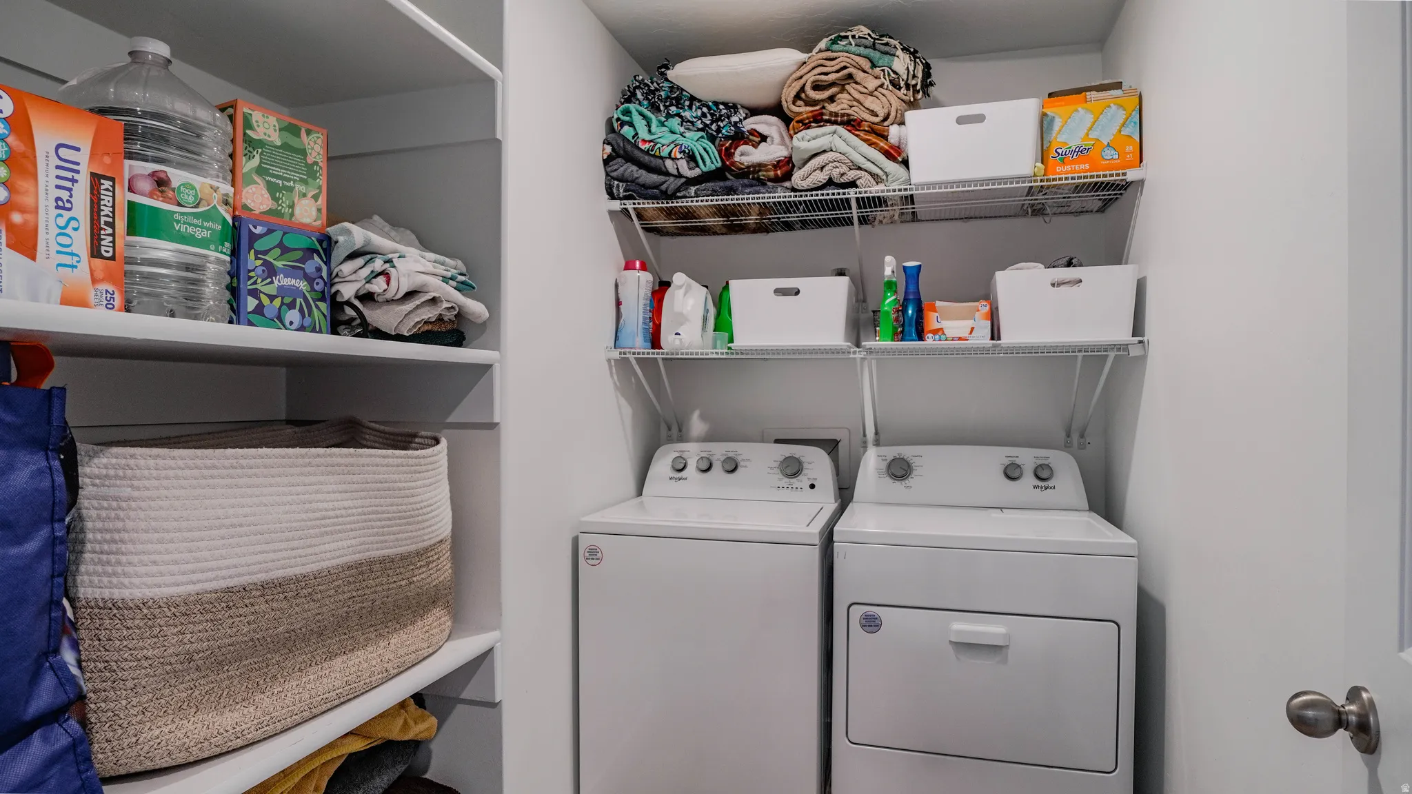 Laundry room featuring washer and clothes dryer