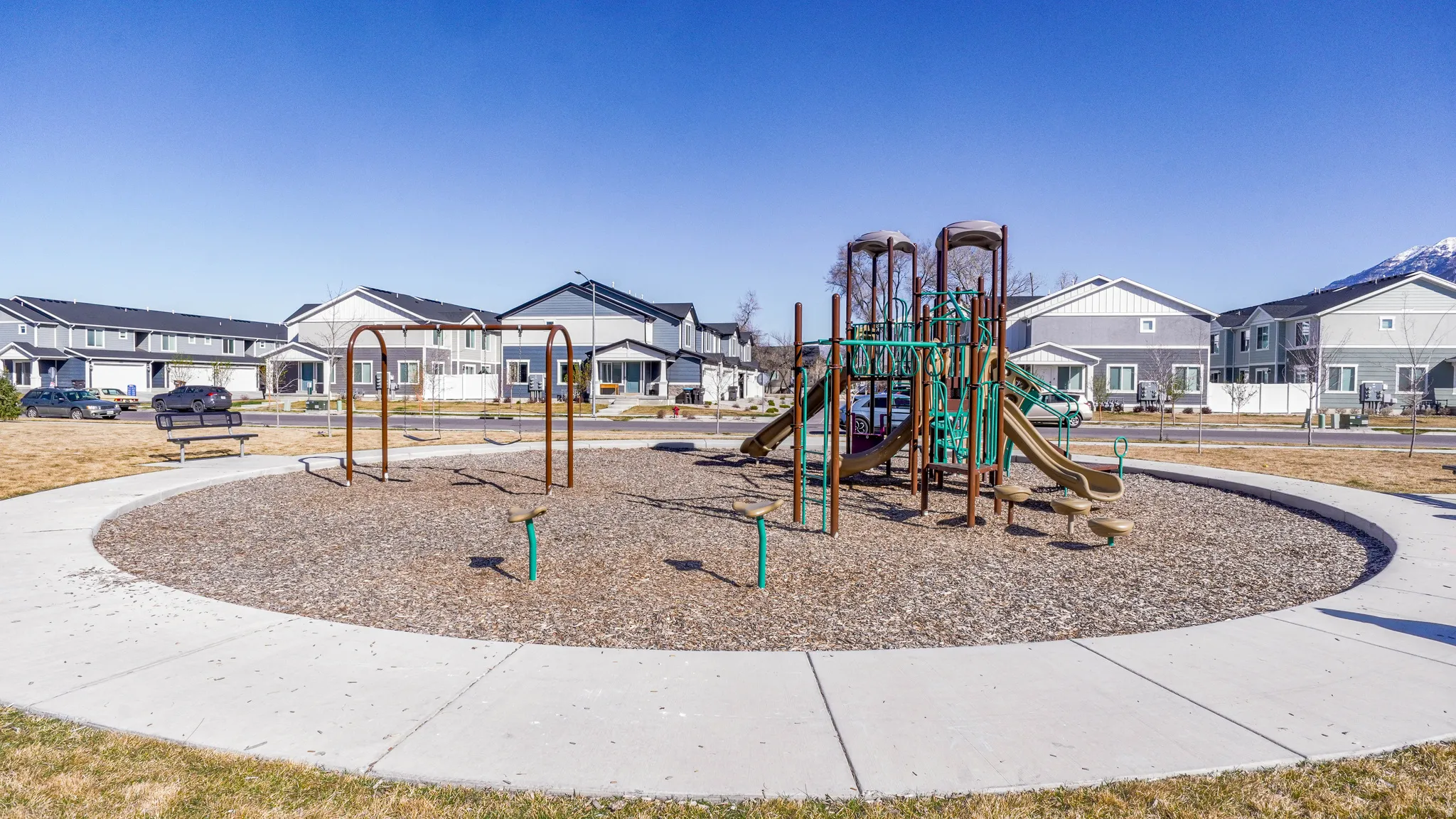 Community jungle gym featuring a residential view