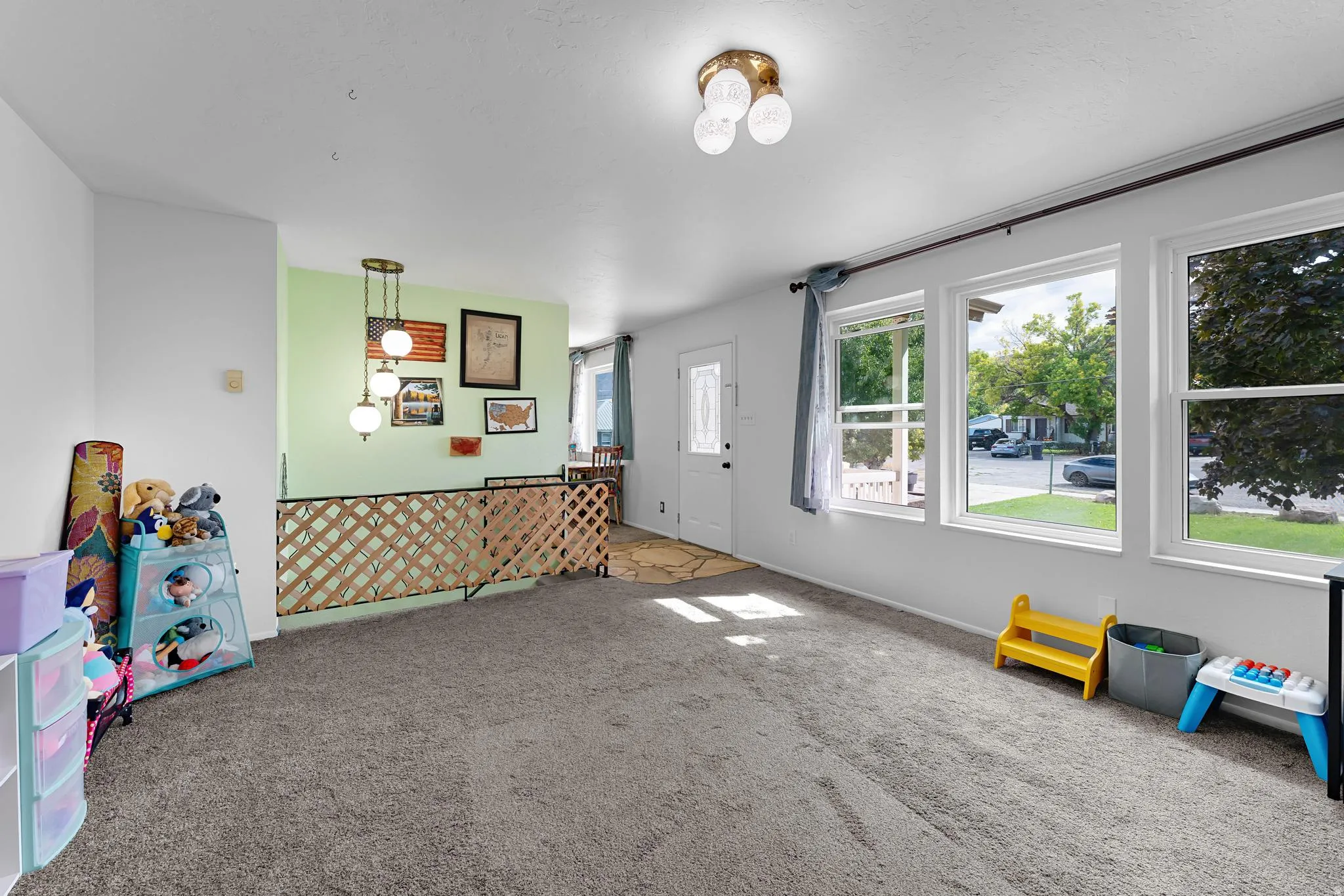 Recreation room with baseboards and carpet floors