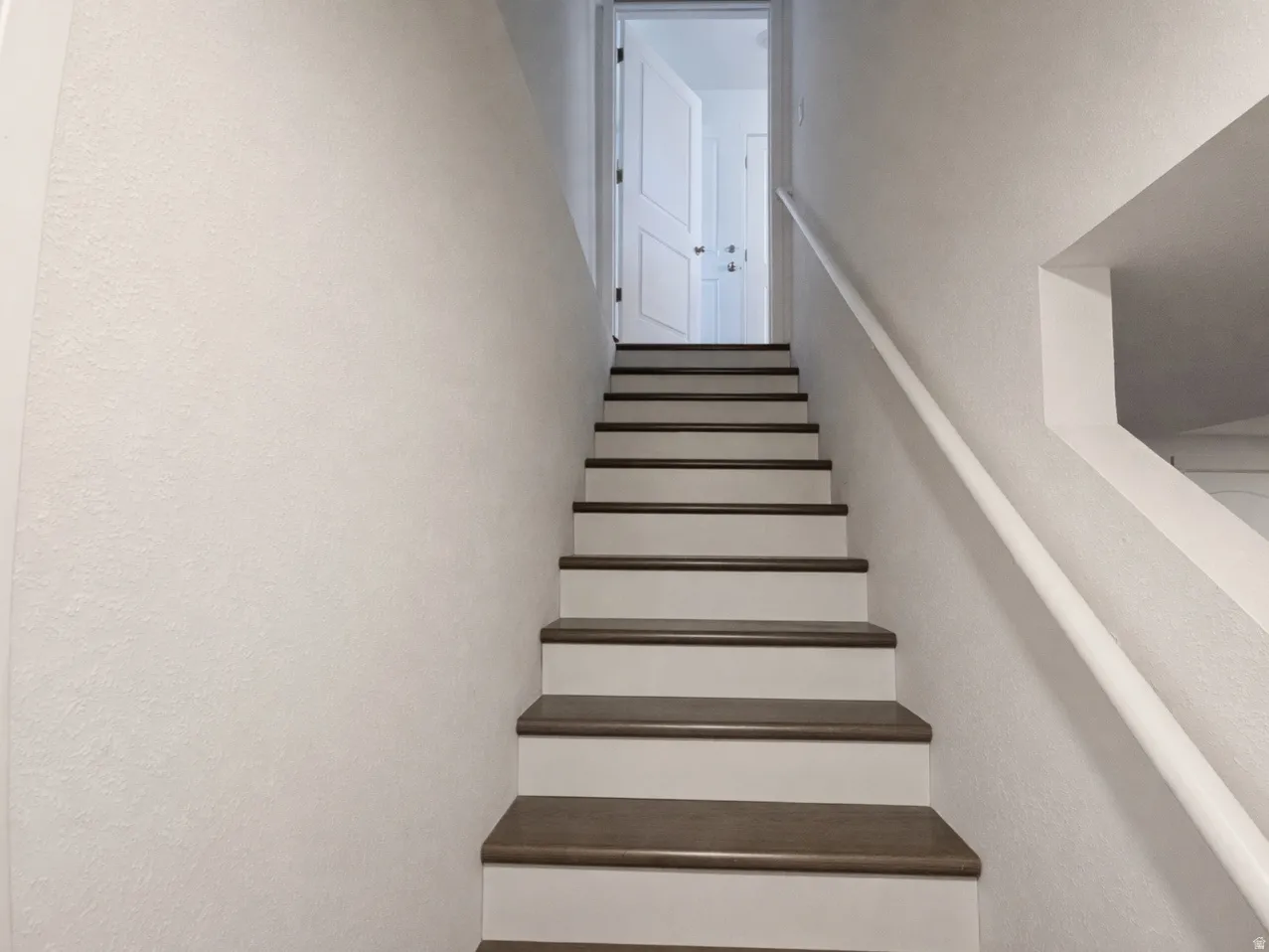 Stairs with a textured wall