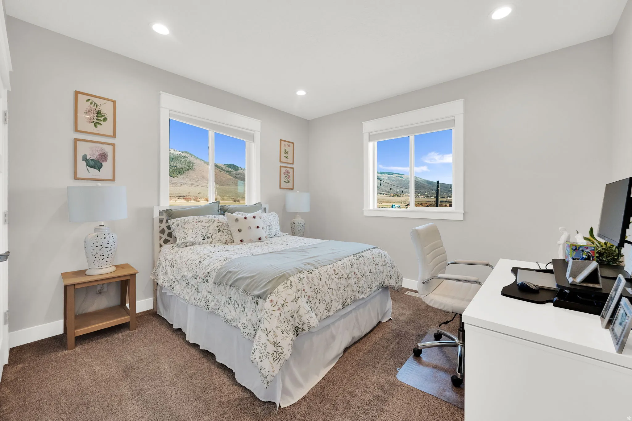 Bedroom featuring a desk, multiple windows, dark colored carpet, and recessed lighting